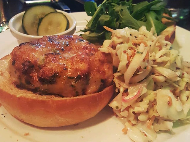 Crab burger with pasta and sides
