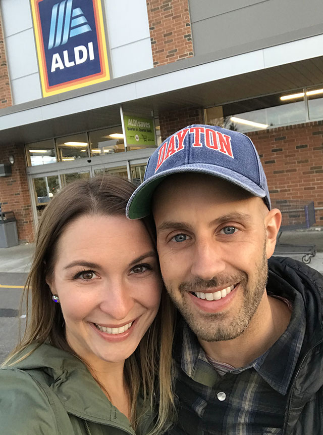 Donny with wife in front of Aldi grocery store