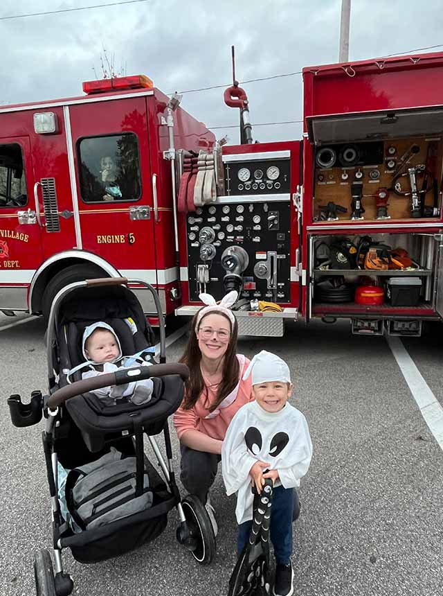 Kiersten with kids and fire truck