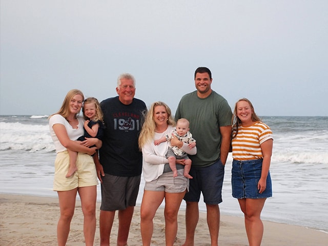 Kristen and family at the beach.