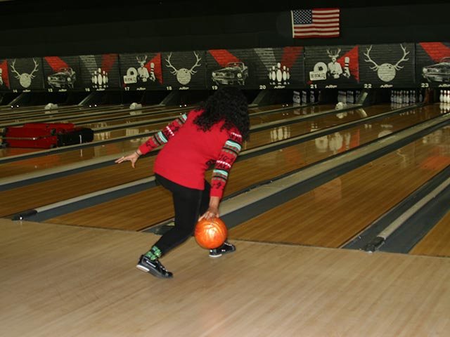 Jenn bowling a strike