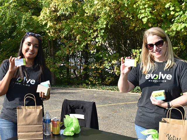 Jenn & Katie showing off new promo items