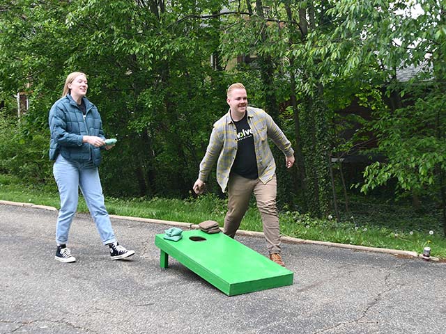Kristen and Colton playing cornhole