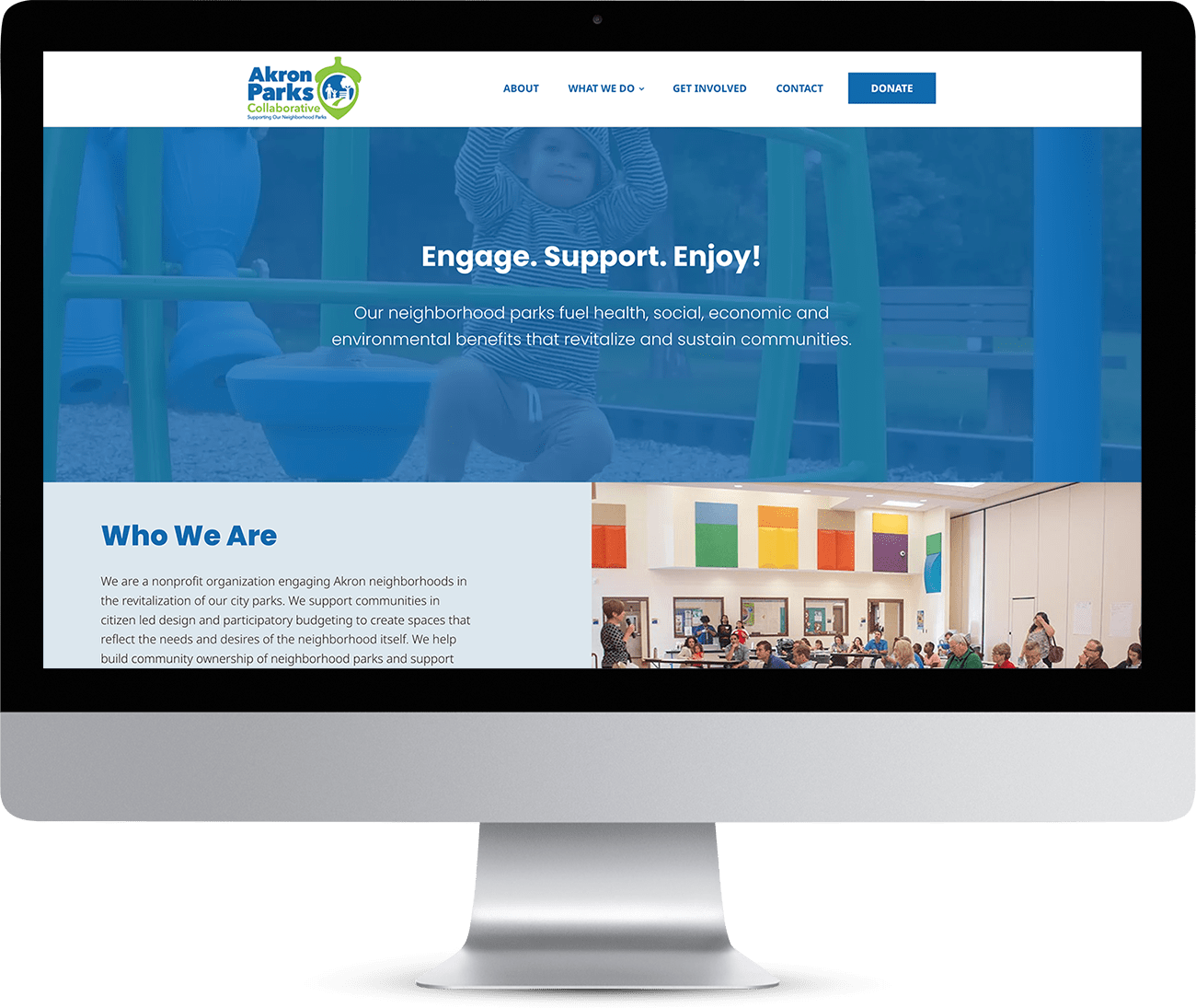 Akron Parks Collaborative homepage design on PC monitor