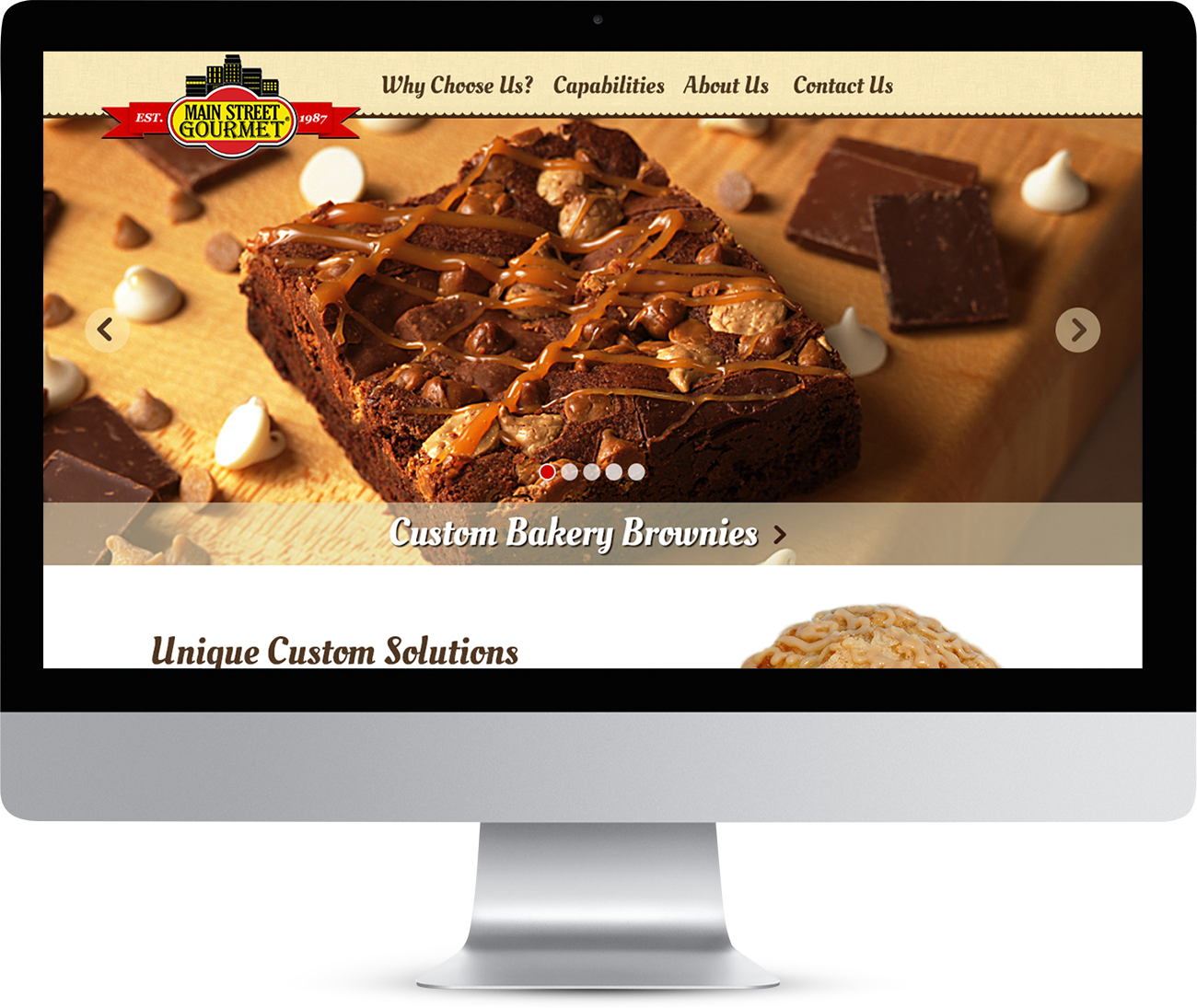 Main Street Gourmet website homepage showing on a monitor screen