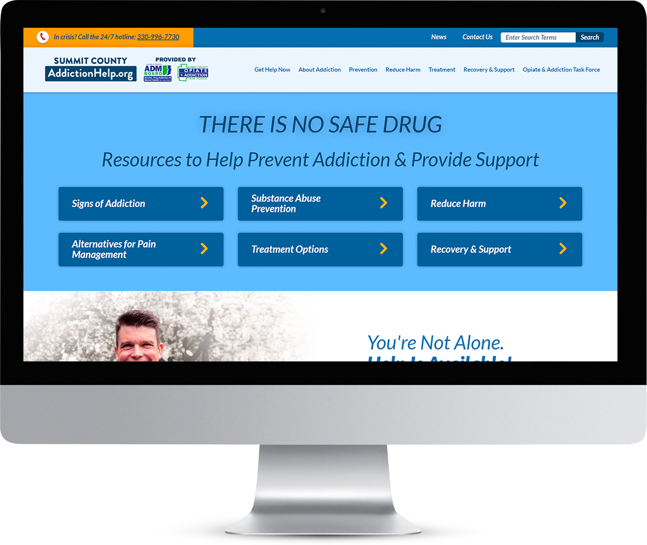 ADM Board website homepage showing on a monitor screen