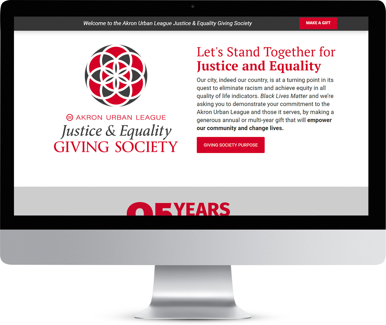 Akron Urban League Giving homepage showing on a monitor