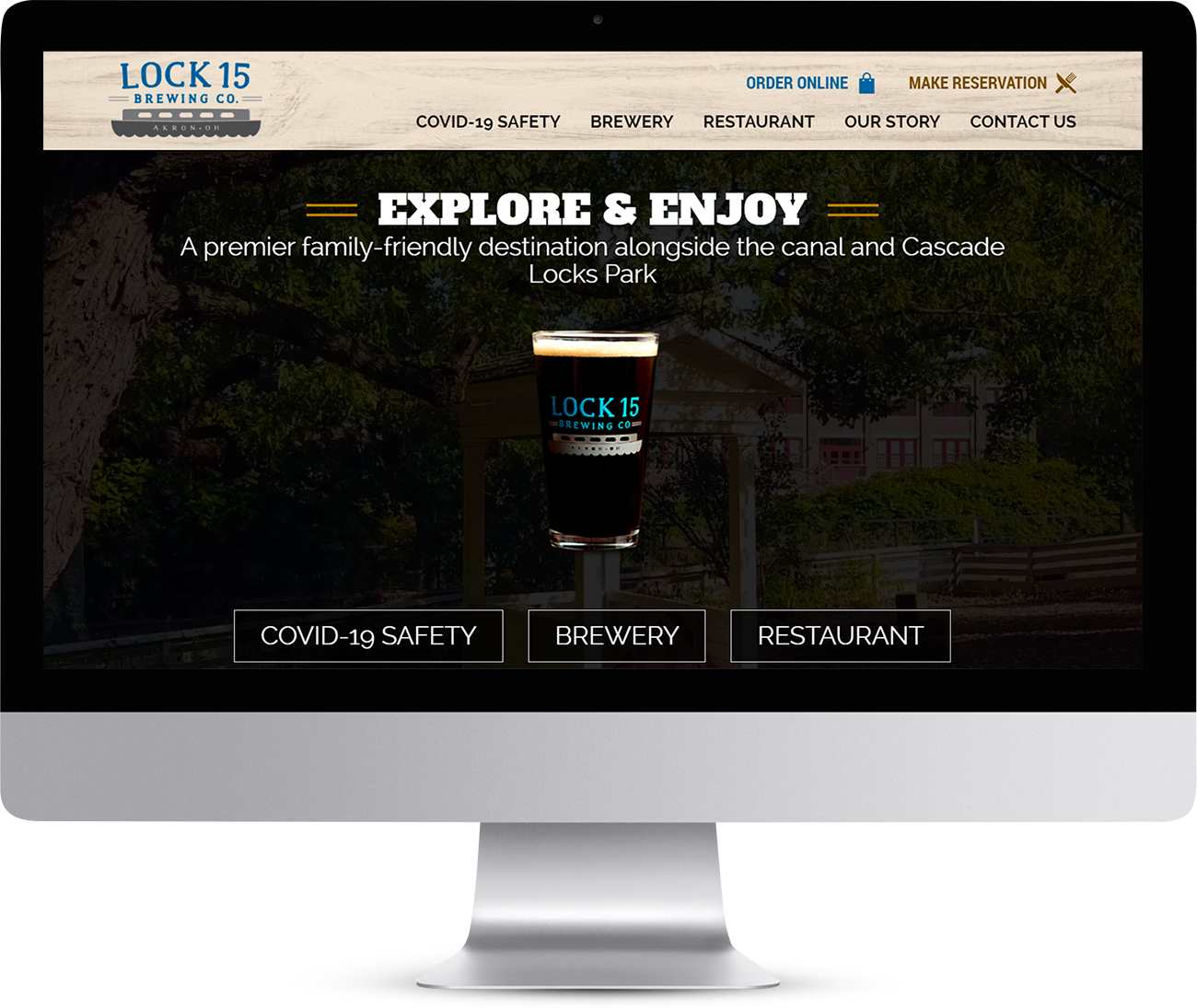 Lock 15 Brewing Company homepage showing on a monitor screen