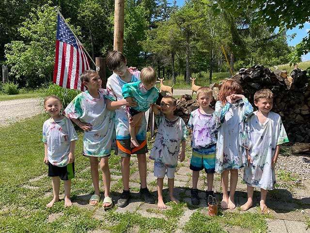 Kids group photo with USA flag