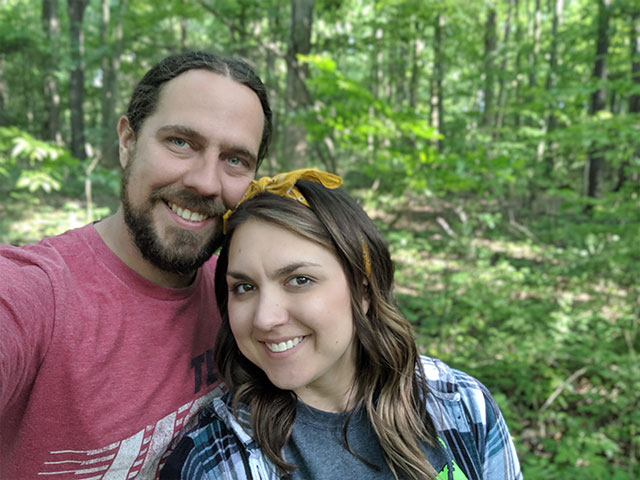 Sierra and Tom out in the woods