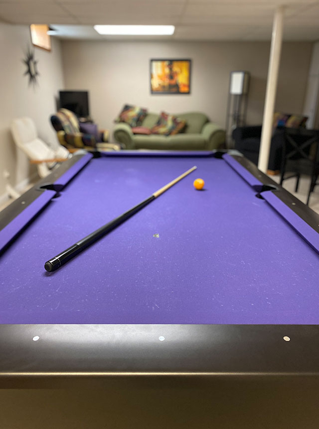 Pool table with stick